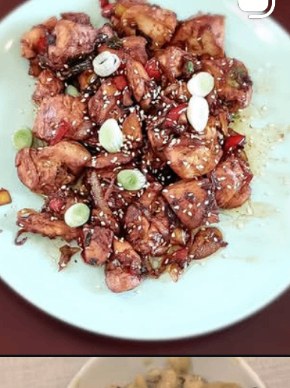 Sesame teriyaki chicken finished with scallions and chili