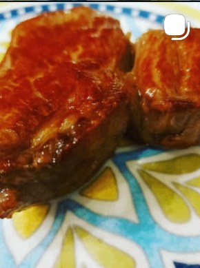 Braised chicken thighs simmered in spiced tomato sauce