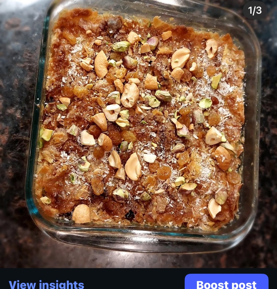 Egyptian um ali baked golden with pistachios and raisins