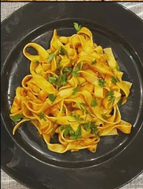 Fresh egg fettuccine tossed in butter and herbs