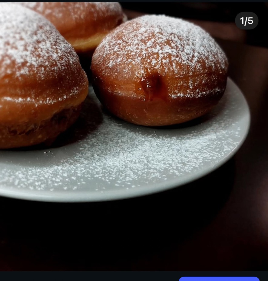 Czech koblihy — jelly-filled donuts dusted with powdered sugar