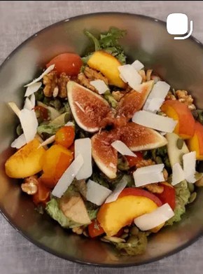 Fall salad with figs, peach, parmesan, and walnuts